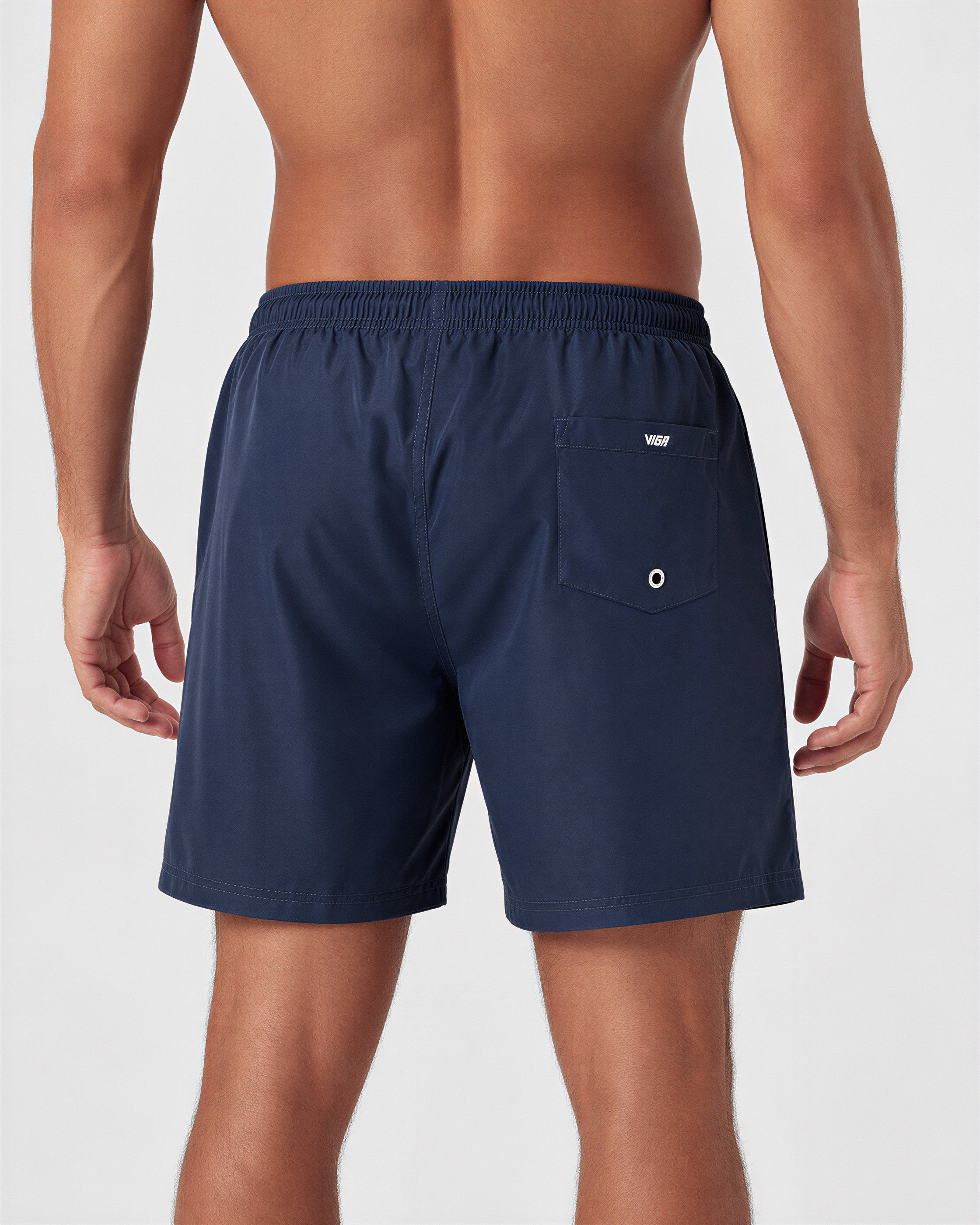 Navy Viga swim shorts — back view with back pocket
