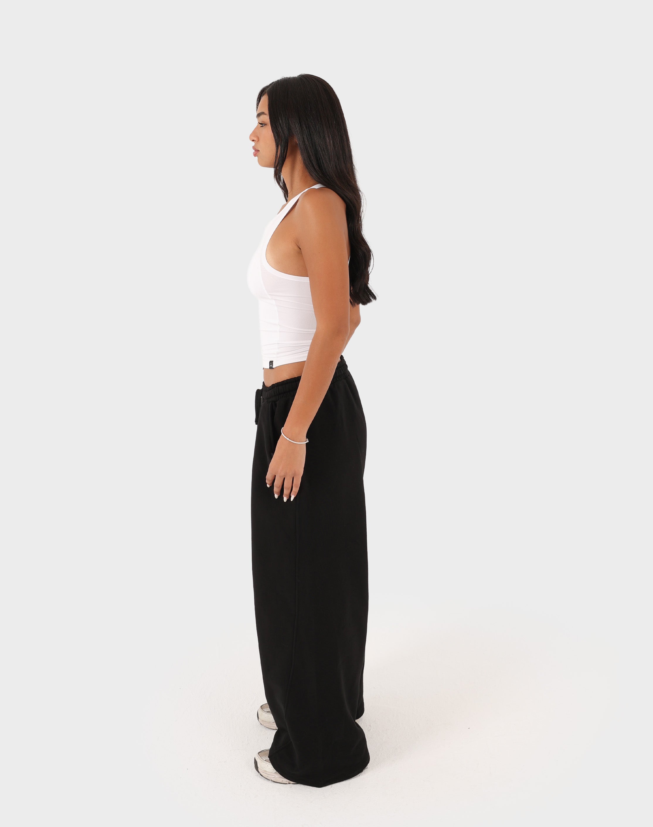 Black Doe Cloud Fit Pants — front view on model