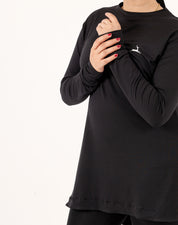 Doe Modest Flow Top in black — lightweight dry-fit modest activewear