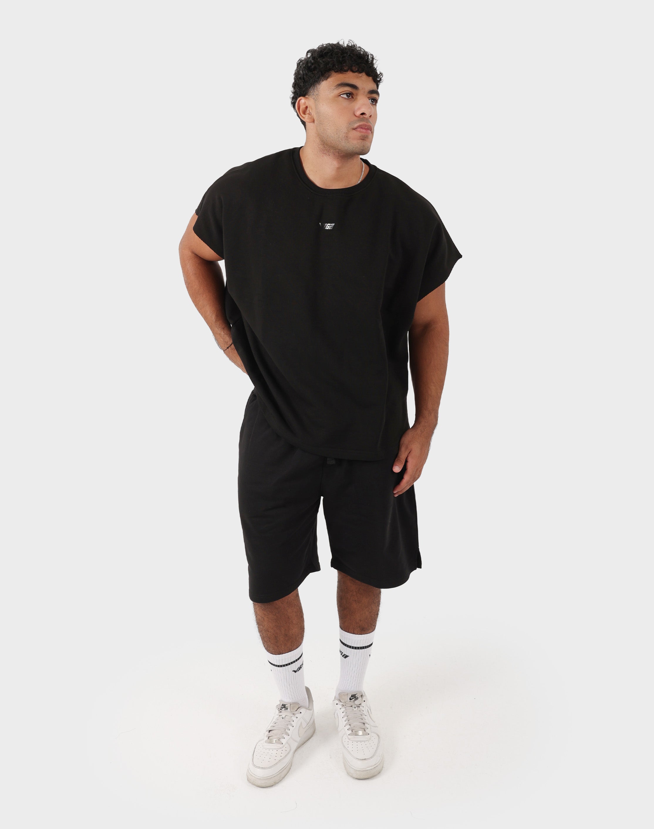 Black Viga 24/7 Shorts styled with oversized tank top