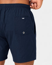 Close-up of waterproof quick-dry fabric on navy Viga swim shorts