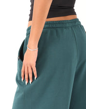 Close-up of brushed cotton fabric on teal green Doe Cloud Fit Pants