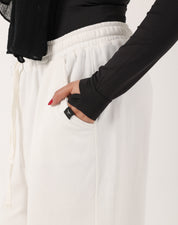 White Doe Cloud Fit Pants — detail of relaxed leg