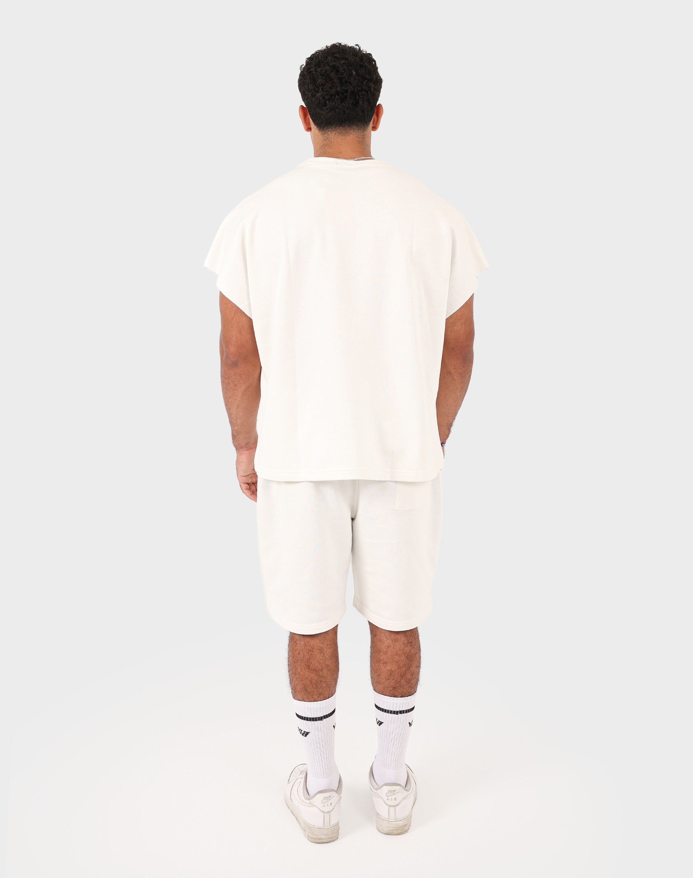 White Viga Box Fit Tank Top — front view on model